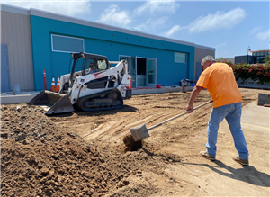 Construction crew at work on Building H.